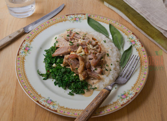 Milk Braised Pork and Grits with Mustard Greens and BBQ Fried Peanuts