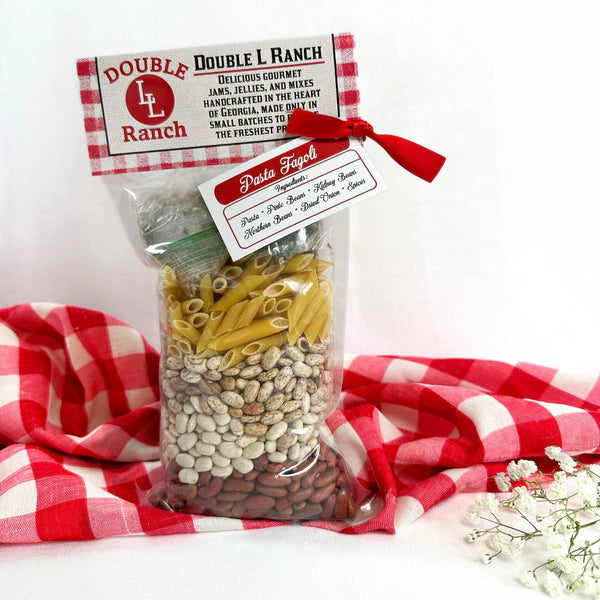 Double L Ranch Pasta Fagoli Dinner Mix bag displayed with flowers and tablecloth